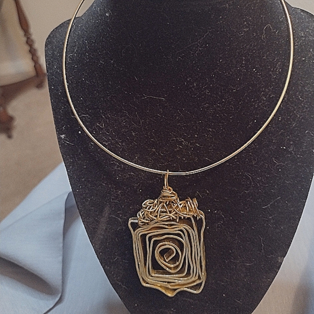 Hand crafted gold-tone pendant necklace